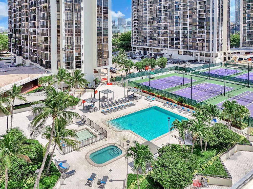 Located in Brickell Avenue on Biscayne Bay, offering breathtaking 180 degree views of the bay and Miami skyline.