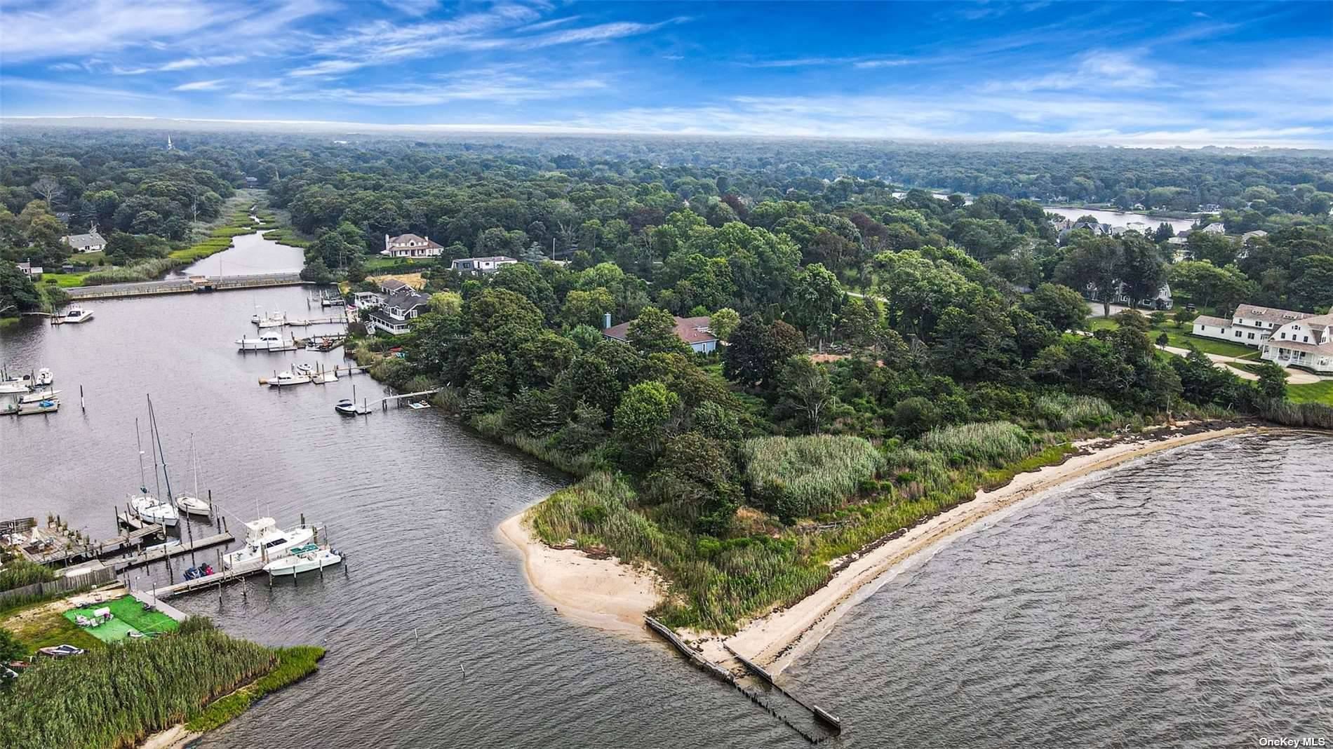 Discover a rare opportunity to own a slice of paradise in the heart of Desirable Center Moriches.
