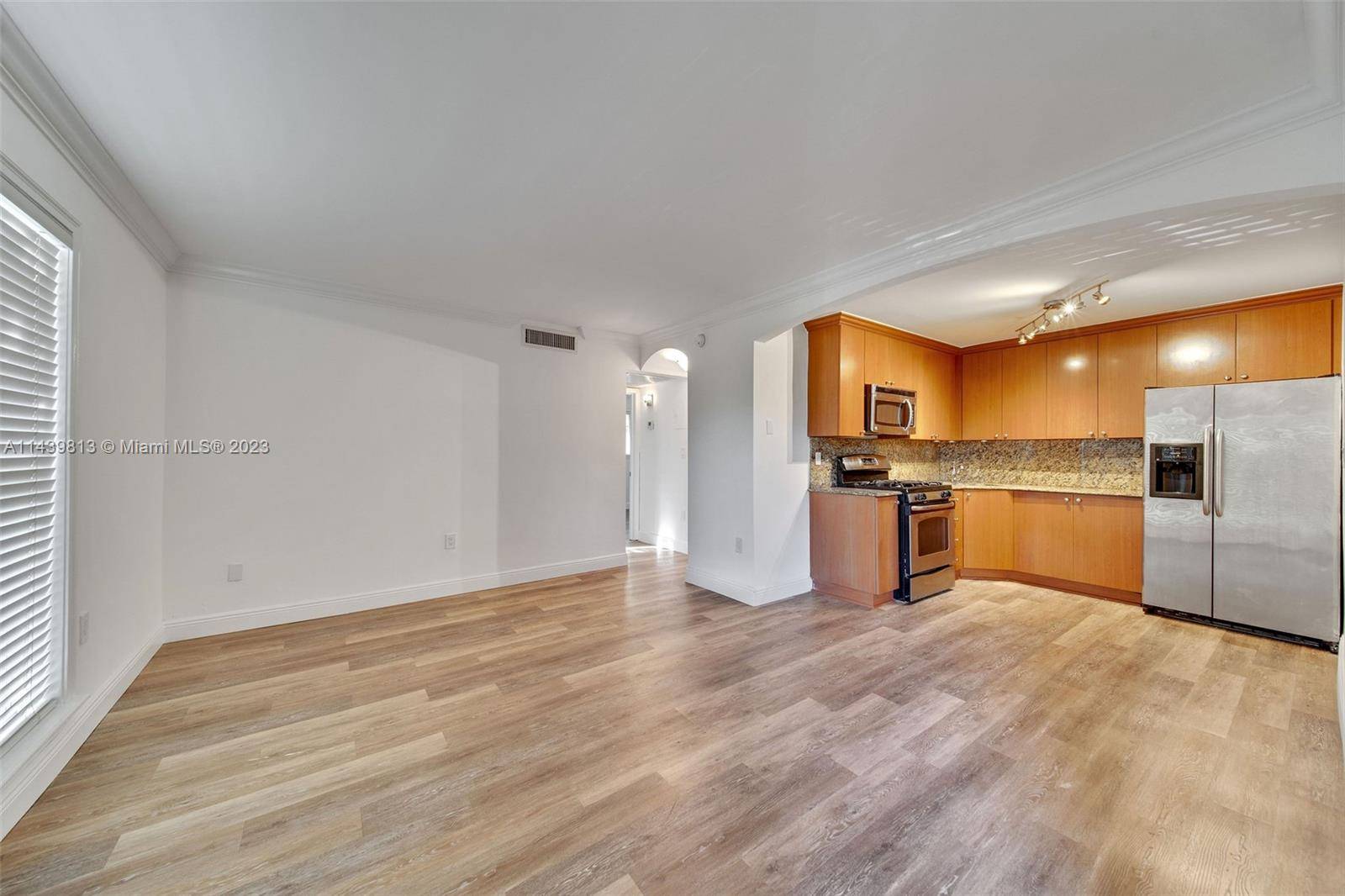 Light and bright 2 bedroom corner unit with a terrific Coconut Grove address.
