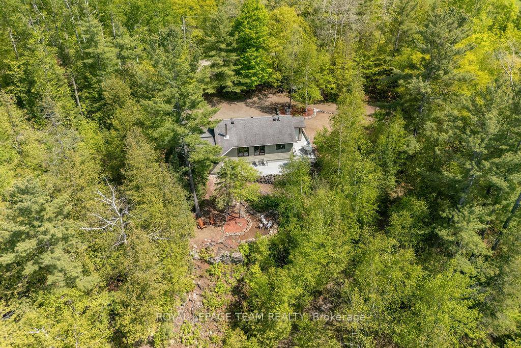 Cottage Season Awaits ! Year round escape on coveted Stones Lake !