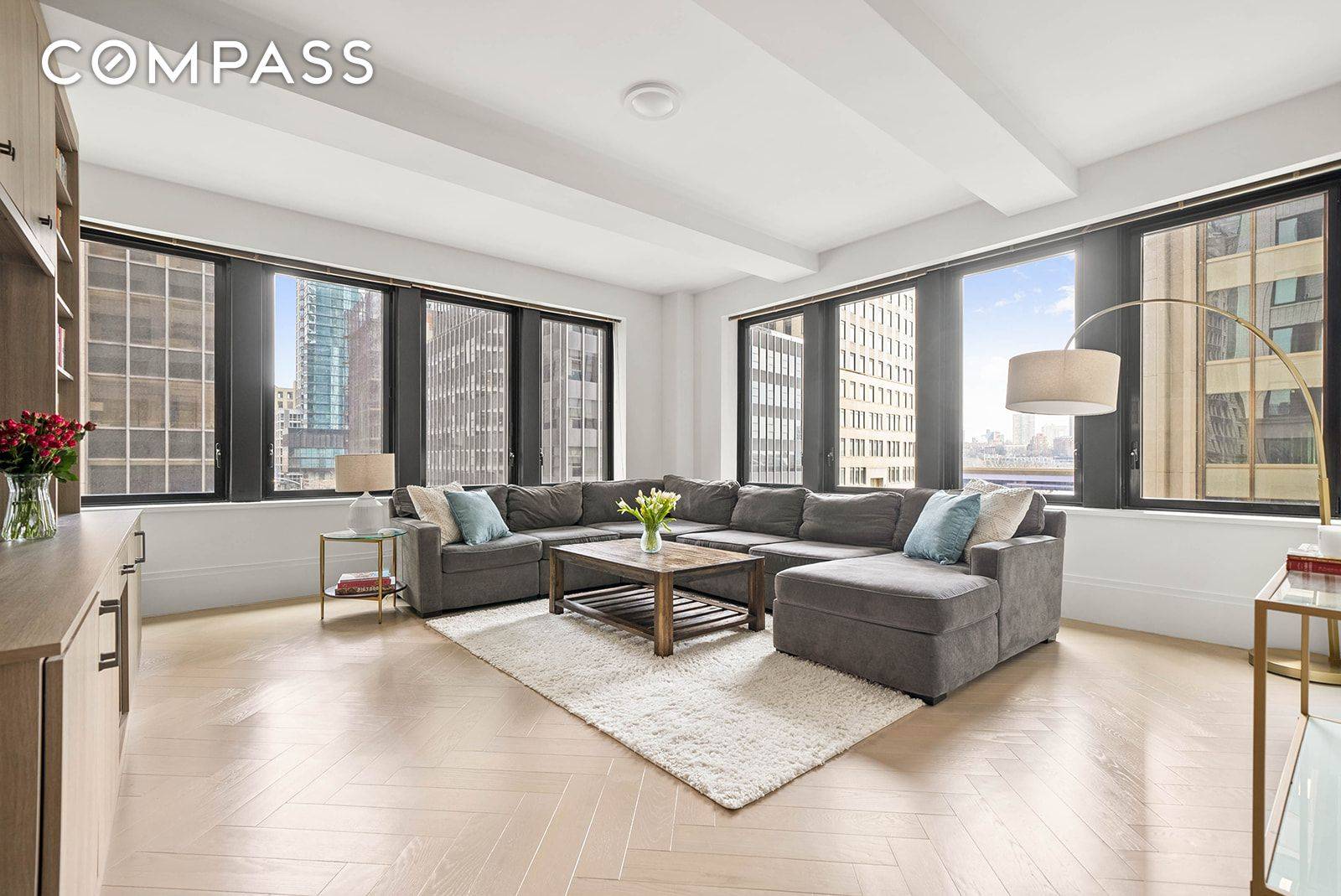 CONTACT LISTING AGENT TO SCHEDULE A SHOWING Welcome to an extraordinary residence nestled where Wall Street meets the Seaport, and where sophistication meets modern living.