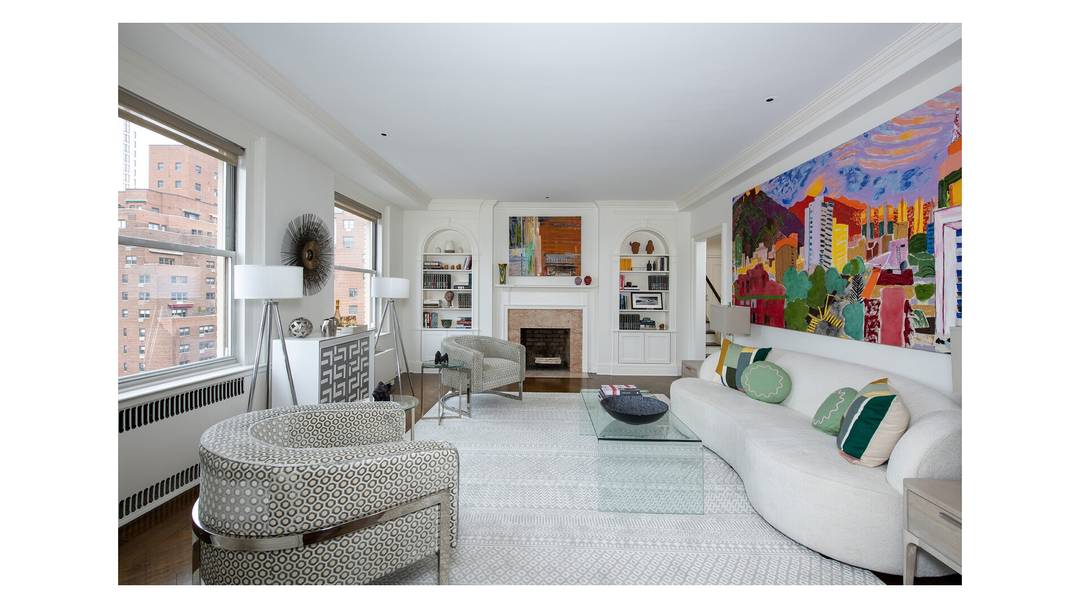 Gracious Three Bedroom Duplex in a White Glove Prewar Cooperative This elegant three bedroom, three bath duplex residence combines classic prewar scale with today's flexibility.