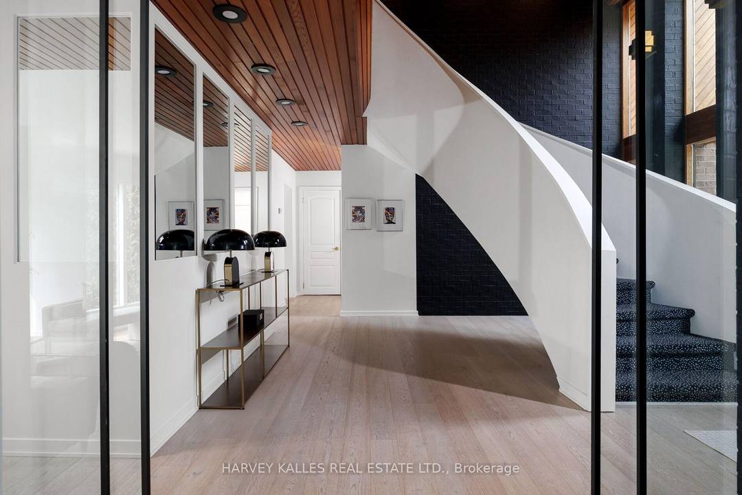 Say yes to the absolute best ; this Markland Wood mid century modern home is the pinnacle of style and comfort with unique details and a timeless aesthetic.