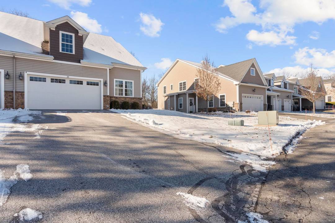 Discover the perfect blend of privacy and convenience in this highly desirable town home at 20 Brookview Circle.