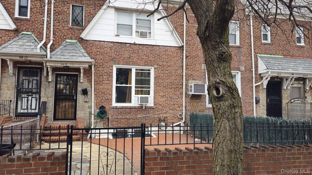 Welcome to this brick attached single family home on a residential block in East Elmhurst.