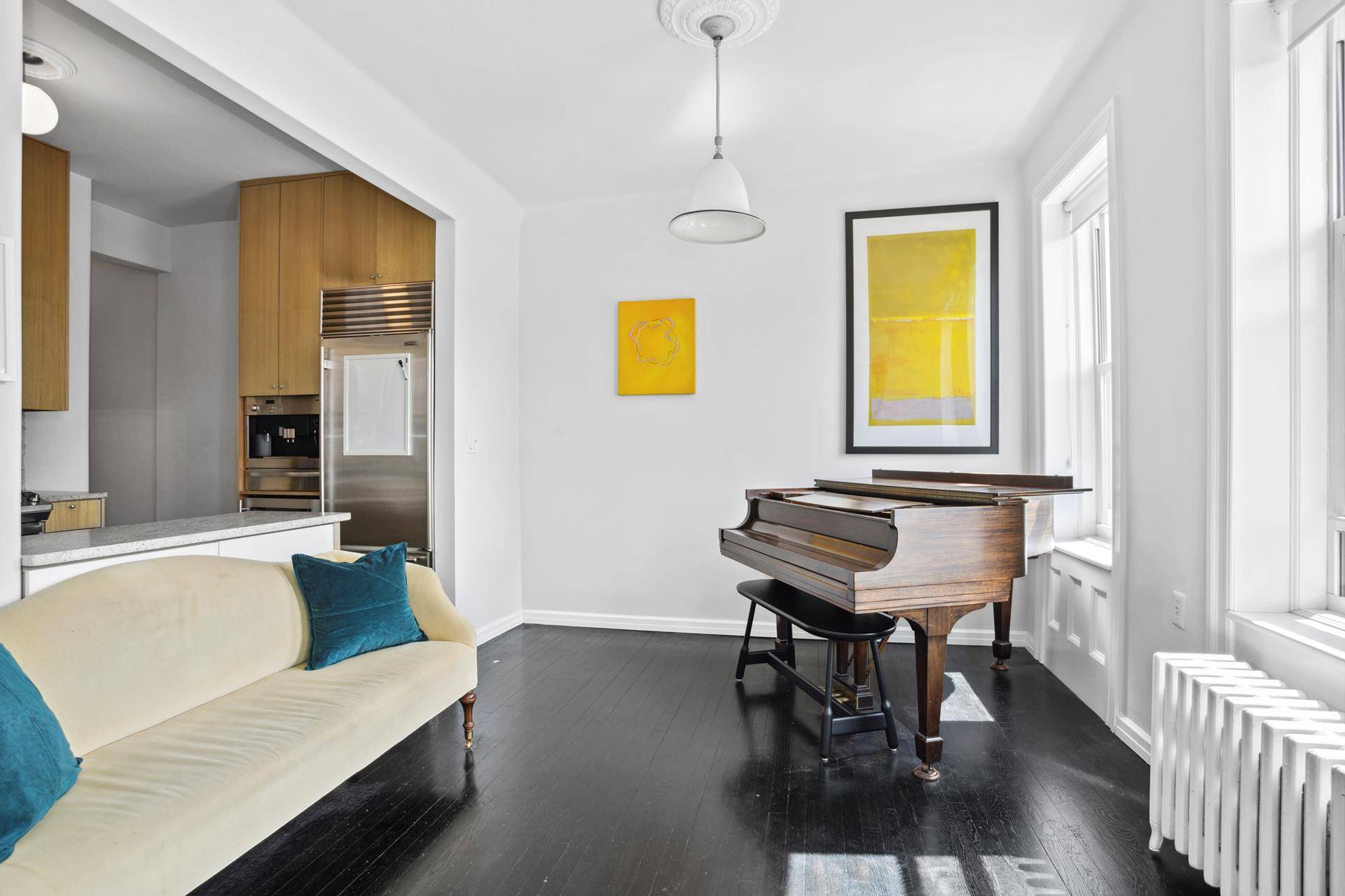 This rarely available and pristinely charming pre war five room, two bedroom home office apartment offers exceptional space and value for downtown living.