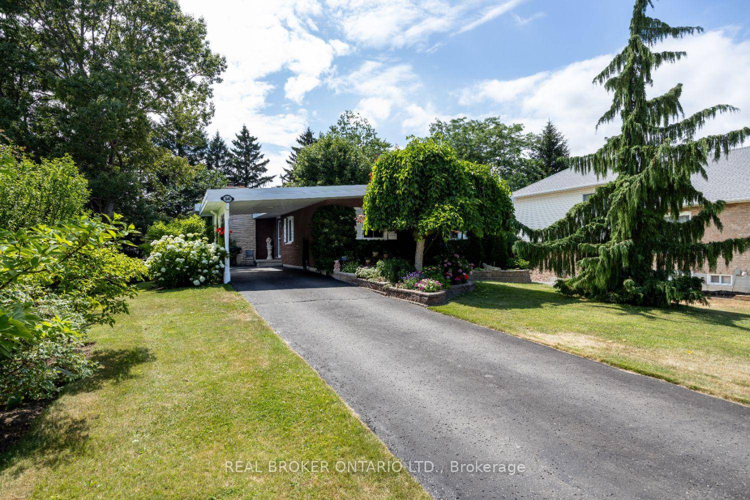 Move right into this meticulously maintained 3 1 bedroom bungalow, nestled on an impressive half acre lot right in town a truly rare find !