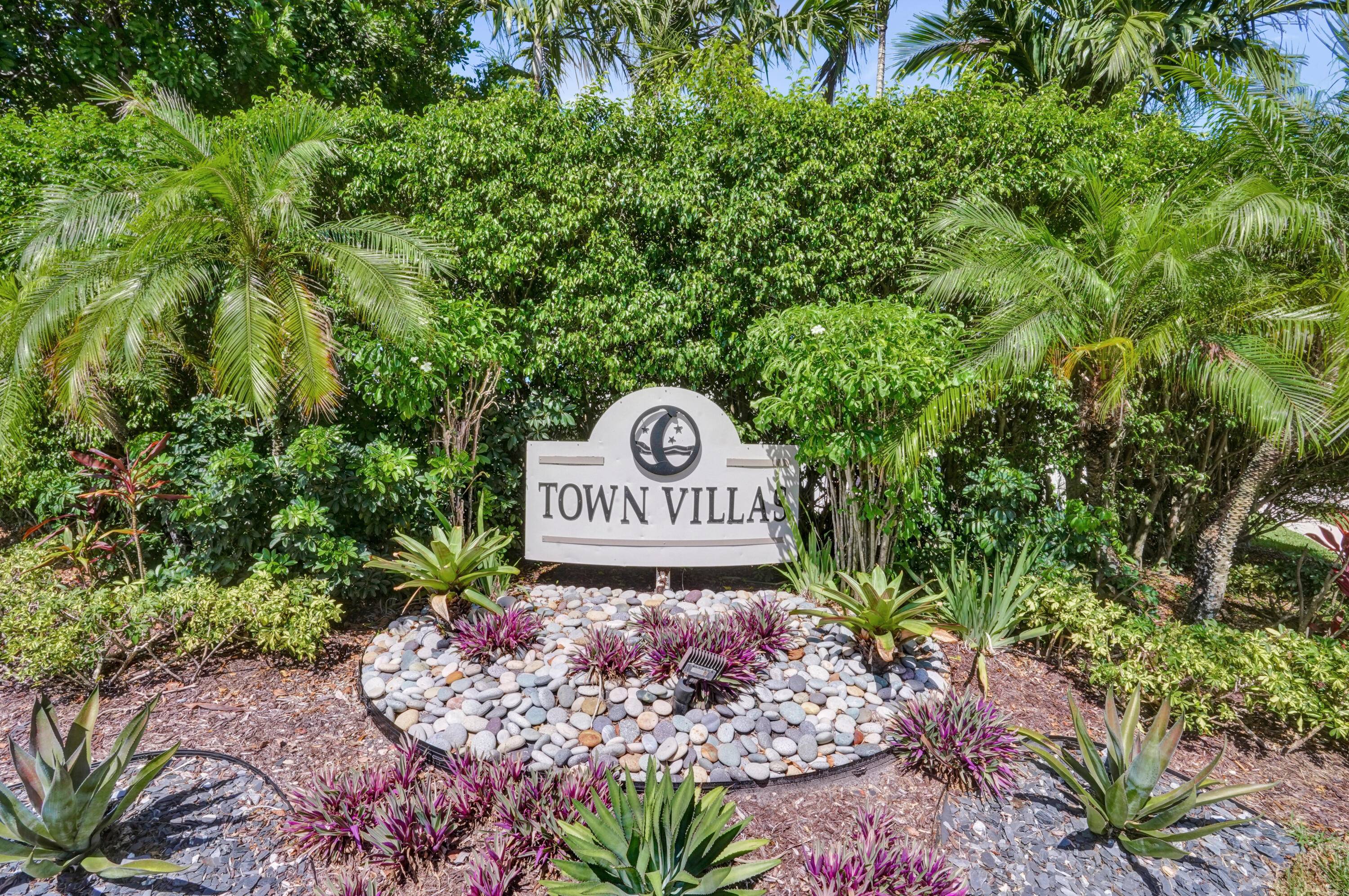 PRICED TO SELL ! Well maintained 2 2 Corner and Lake Villa in a very active community of Town Villas.