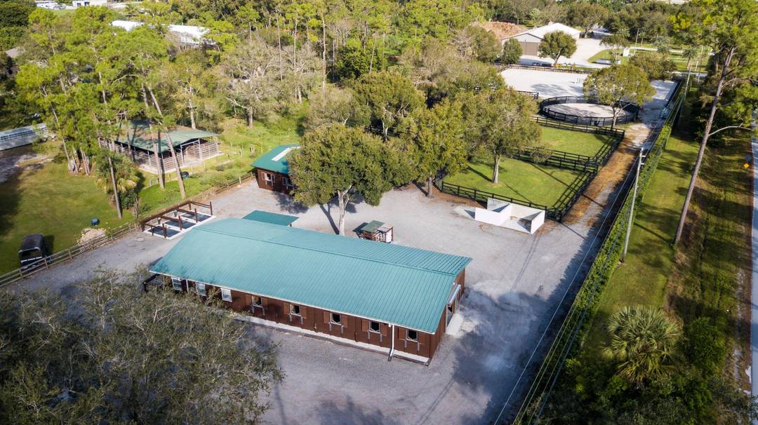 This serene equestrian farm has an amazing location just across Southern Blvd on a paved road and is only about a 10 minute drive to WEF.