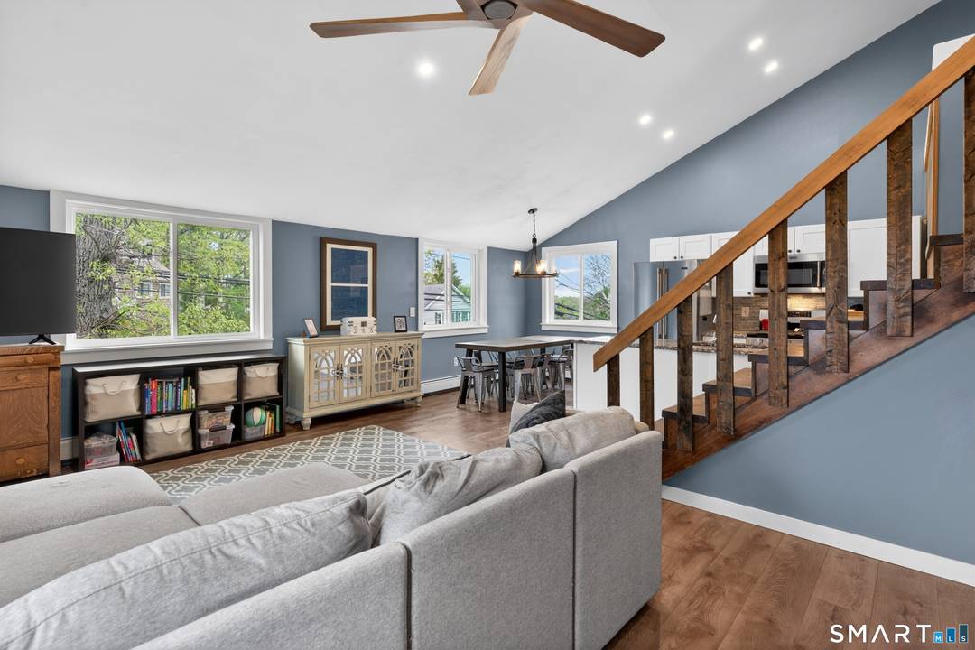 Welcome to 68 Ivy Street, a beautifully updated two family home steps from the heart of Branford Center.