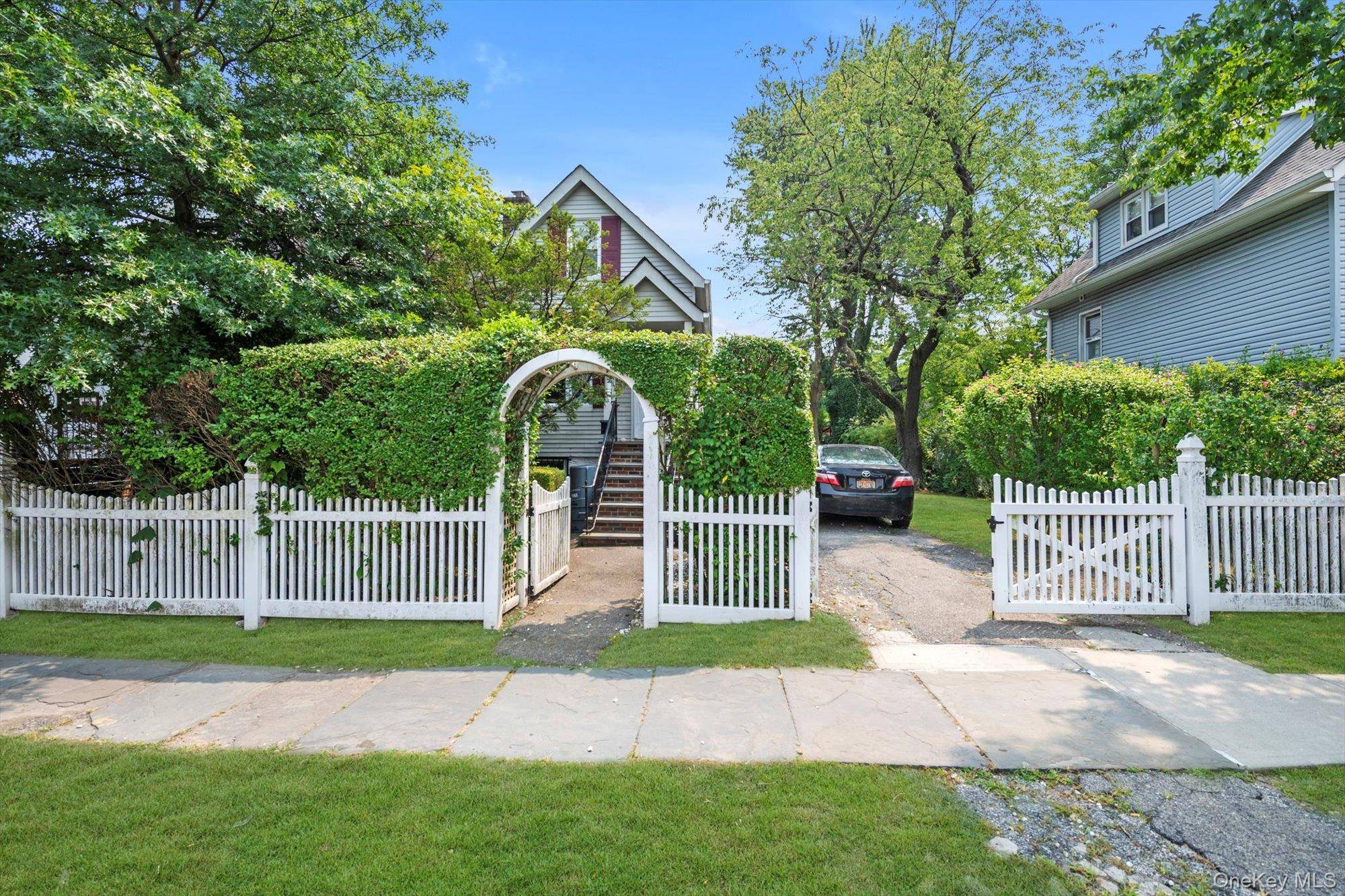 1906 is a single family home built in 1920 with two stories and an Extra Lot Used as a Yard.