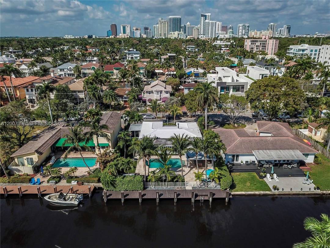 Exceptional Las Olas waterfront residence offering 75 ft of dockage on a wide 90 ft canal with no fixed bridges and direct ocean access ideal for vessels up to 65 ...