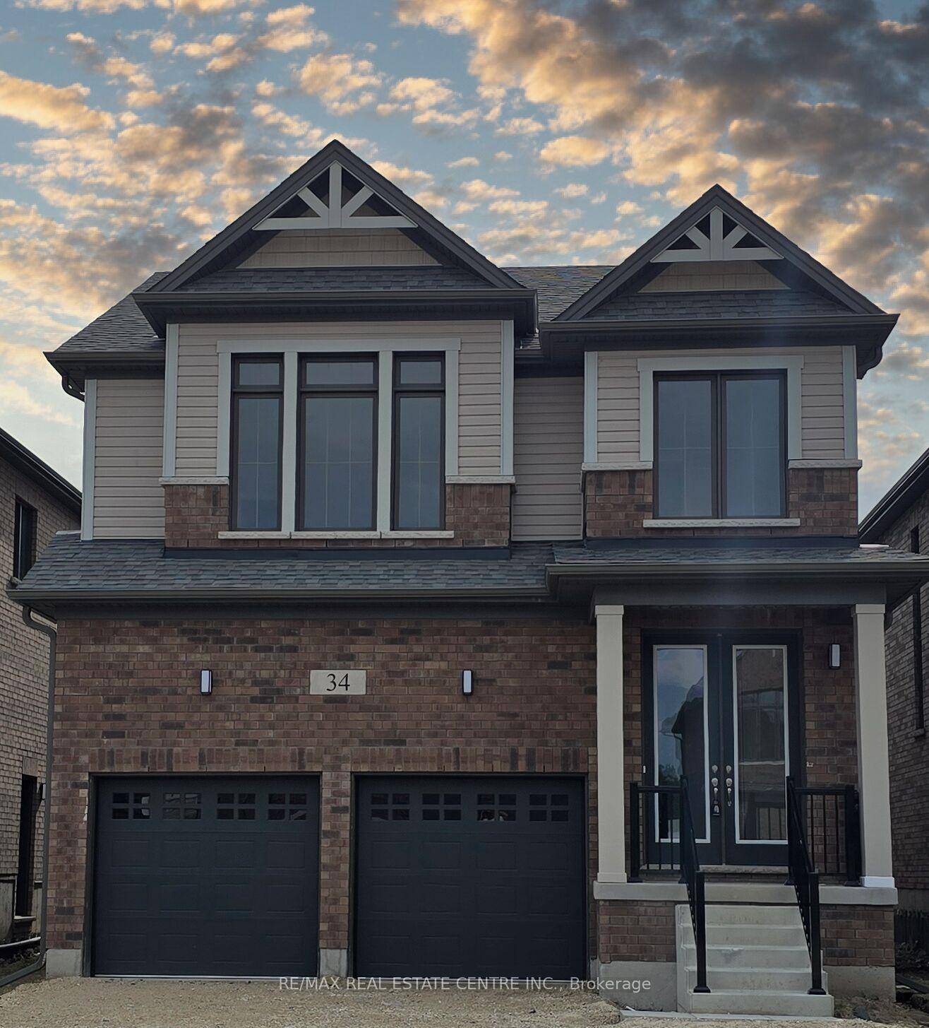 WELCOME TO 34 MARY WATSON ST, Luxury living in AYR, 1 year old, with a grand front double door entry leading to a 9 foot ceiling on main floor, super ...