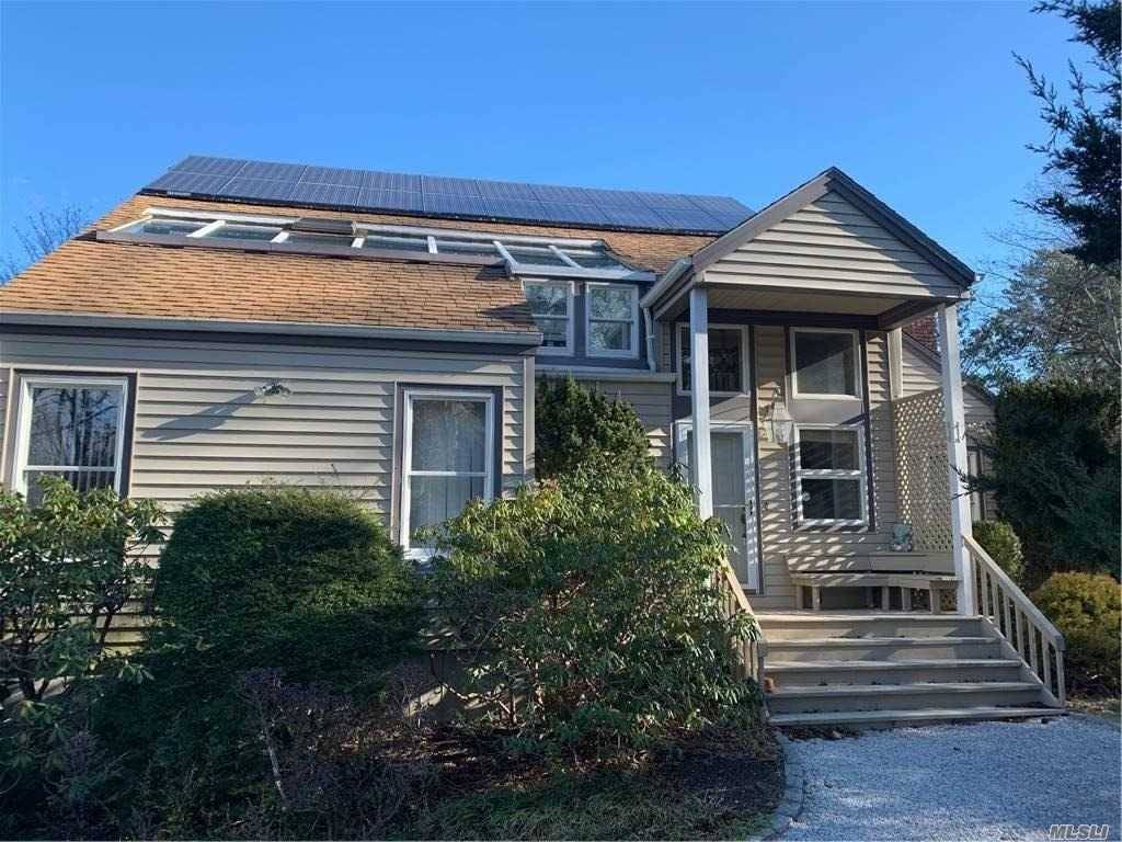 Spend the Summer in this Immaculate Contemporary on a half acre with a large living room with cathedral ceilings, fireplace and sliders to large deck, dining area, kitchen, 2 bedrooms ...