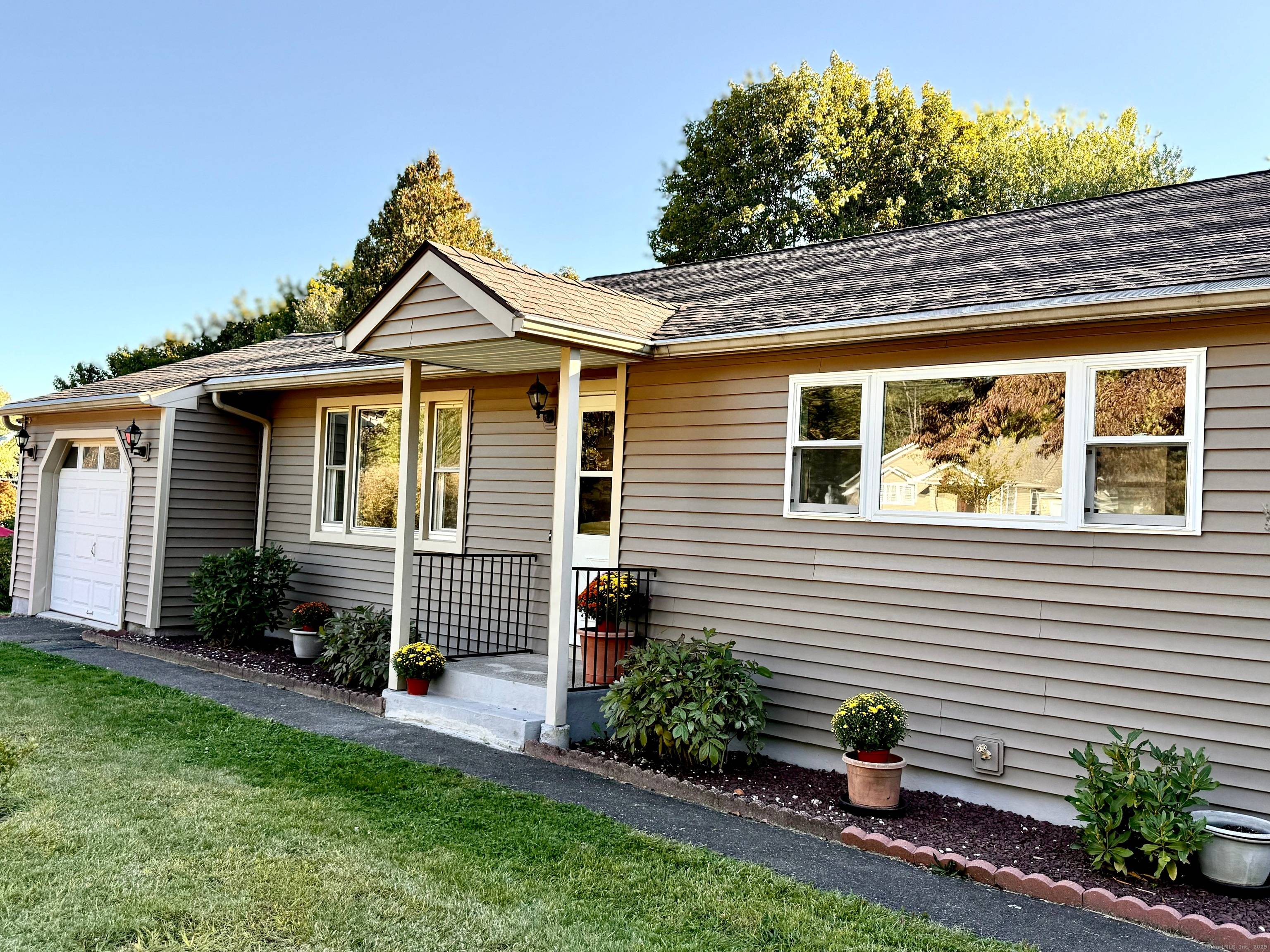 Charming Split Level home beautifully maintained offers Central Air, Gas and Complete Modern Comfort.