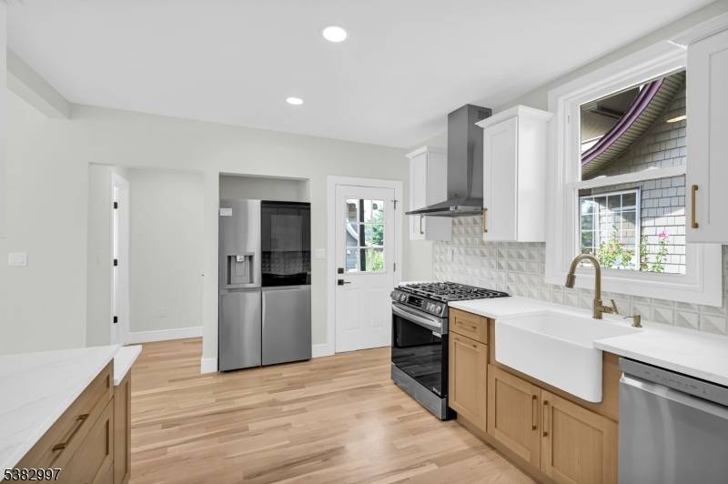 Welcome to this stunning, full gut, 4 Bedroom, 2.