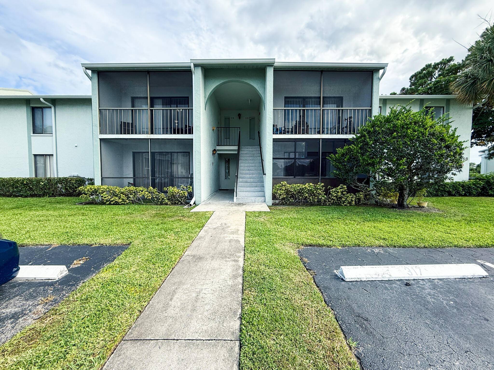 This beautifully maintained first floor condo features 2 spacious bedrooms and 2 full bathrooms, including a newly renovated primary bath.