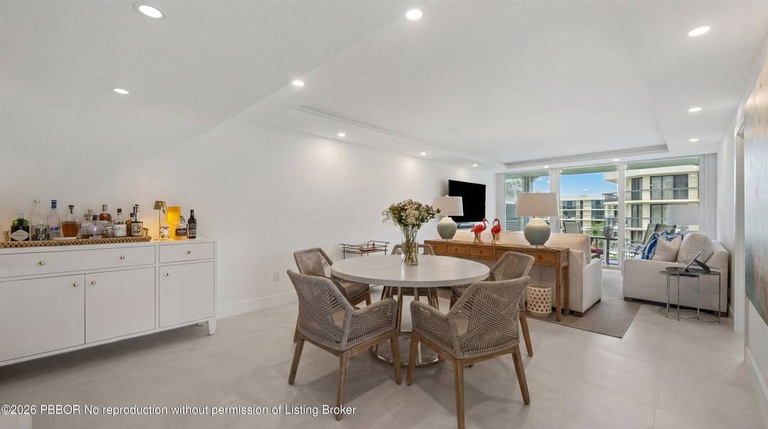 Beautifully and completely renovated 2BR 2BA corner unit at The Cove, showcasing sweeping Intracoastal views.