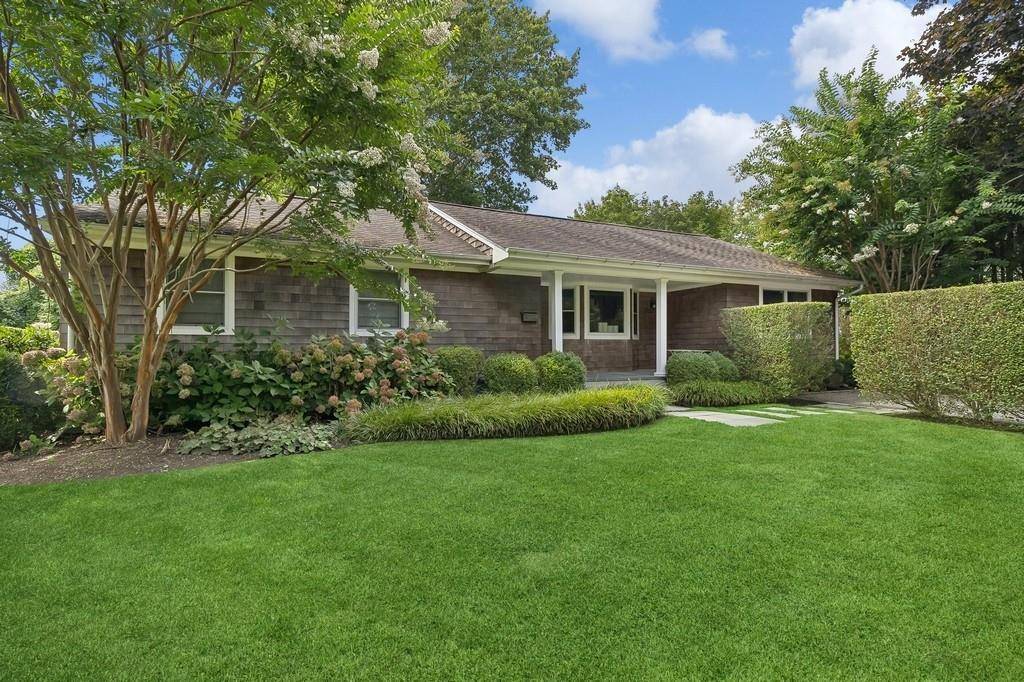 Right in the heart of East Hampton Village, this inviting four bedroom, two bath shingled home is beautifully renovated.