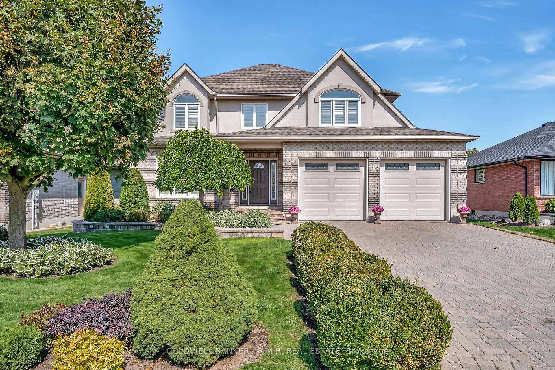 Welcome to this exceptional custom built brick and stucco two story home, perfectly blending timeless design, quality craftsmanship, and thoughtful updates.