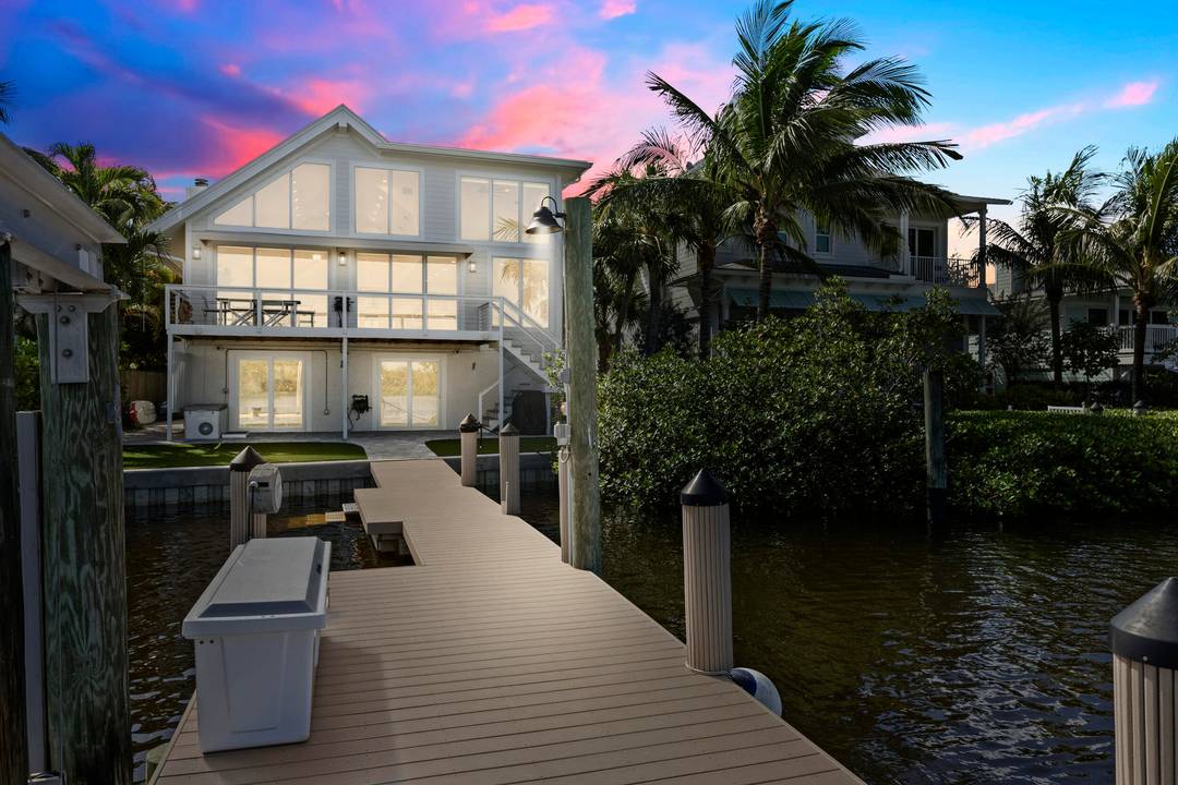 This stunning waterfront home, overlooks the serene waters of Sawfish Island.