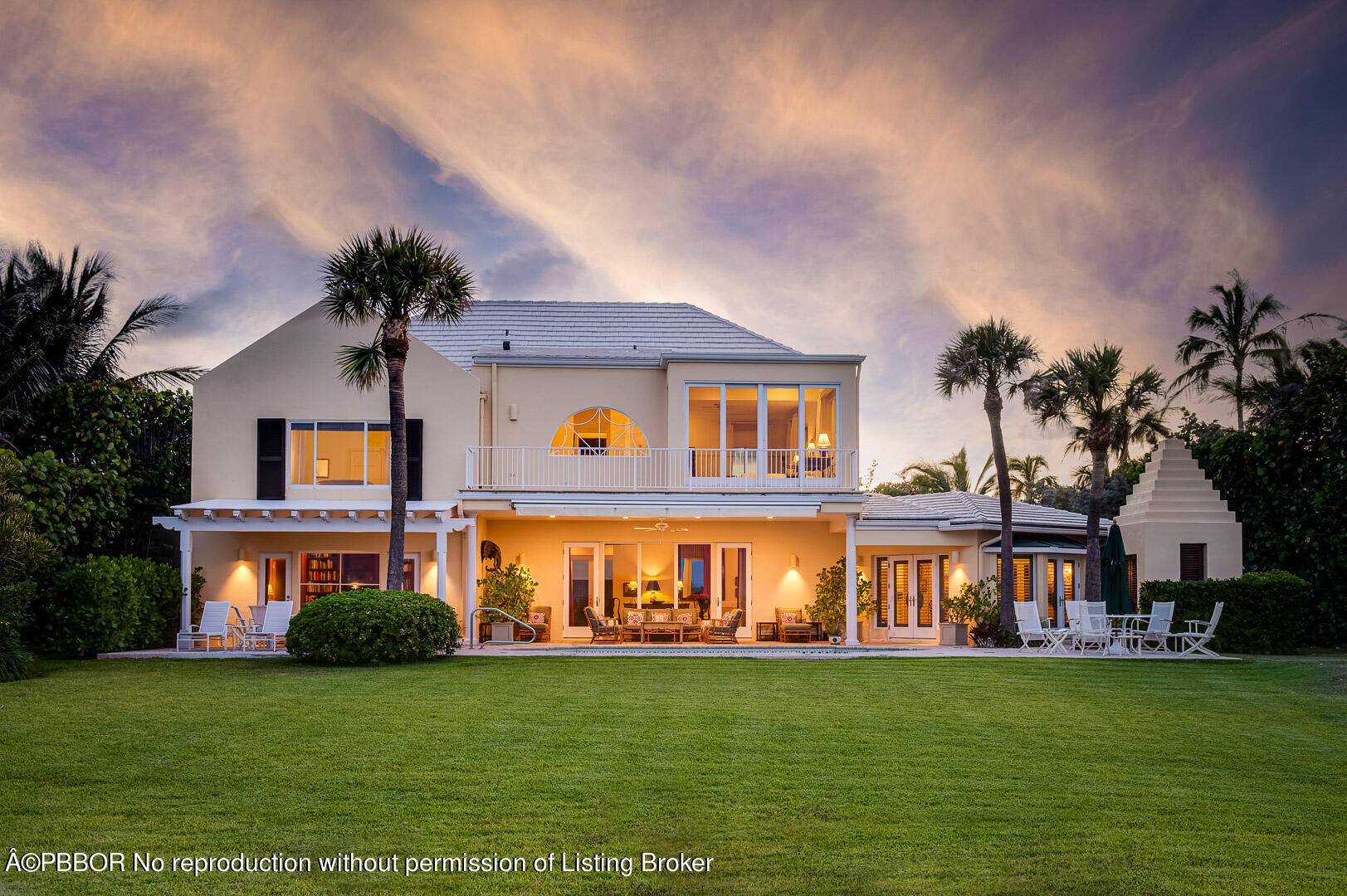 Direct oceanfront home at the north end of Palm Beach Island.