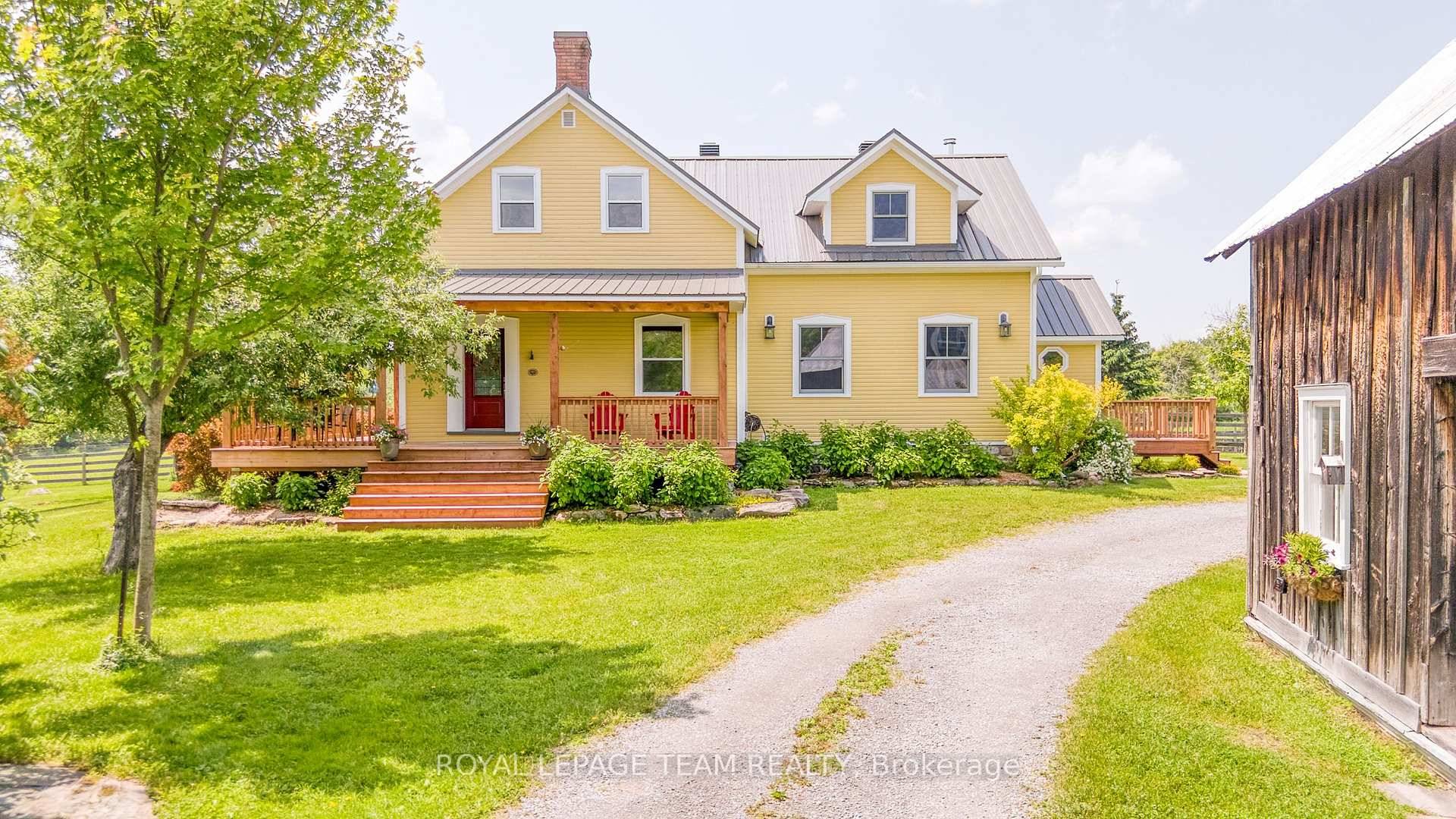 ONE OF A KIND WITH INSTANT CURB APPEAL SET ON 94 ACRES !