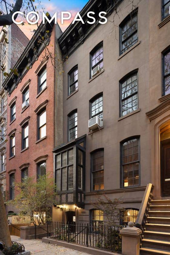 FIRST TIME AVAILABLE IN OVER HALF A CENTURY Fall in love with the storybook charm of this lovingly cared for and elegant townhouse on beautiful Perry Street.