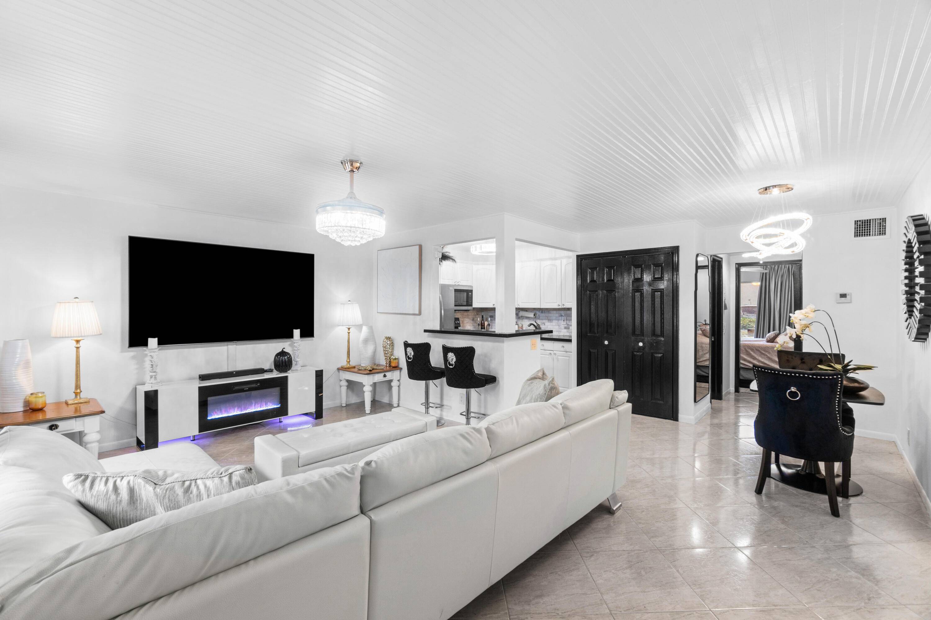 Welcome to your fully renovated and fully furnished turnkey 1st floor condo in the heart of the vibrant 55 active resort style community of Sterling Village !