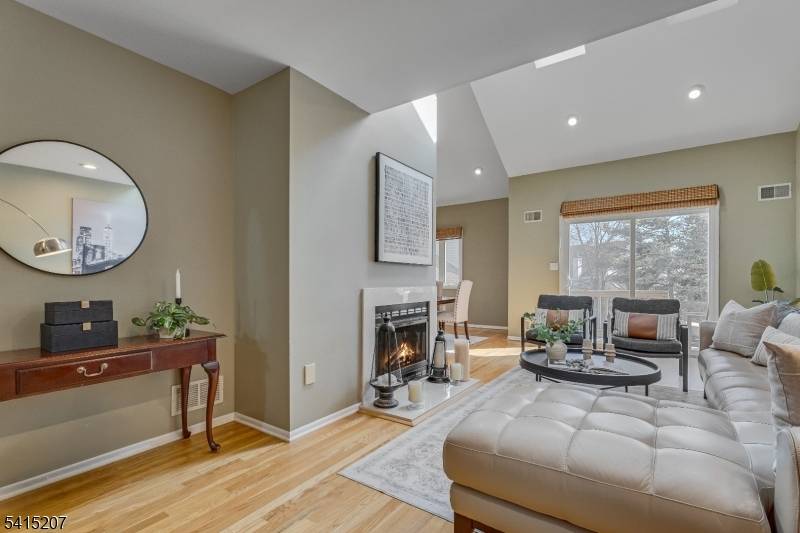 Bright, spacious and beautifully updated Muirfield model in the desirable West Essex Highlands community featuring a first floor primary suite.