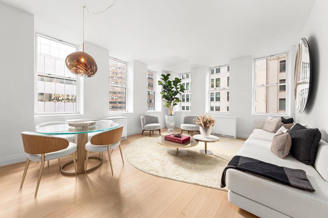 Move In Ready ! Residence 2308 is a 1510 SF, three bedroom, three bathroom apartment within One Wall Street.