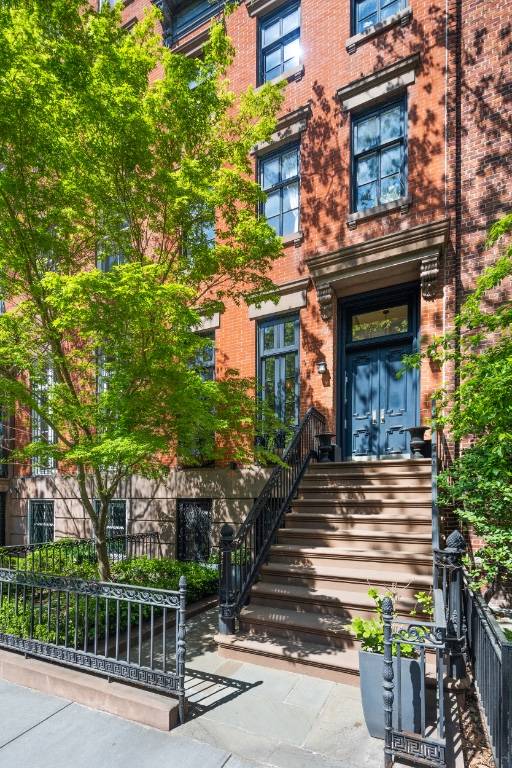 For sale is a luxury multi family townhouse that includes five studios and a triplex with two bedrooms and one and a half bathrooms.