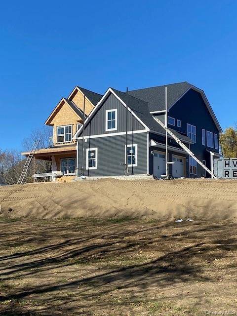 New construction colonial being built in Round Hill Estate, a picturesque 6 lot subdivision nestled in the charming town of Warwick.