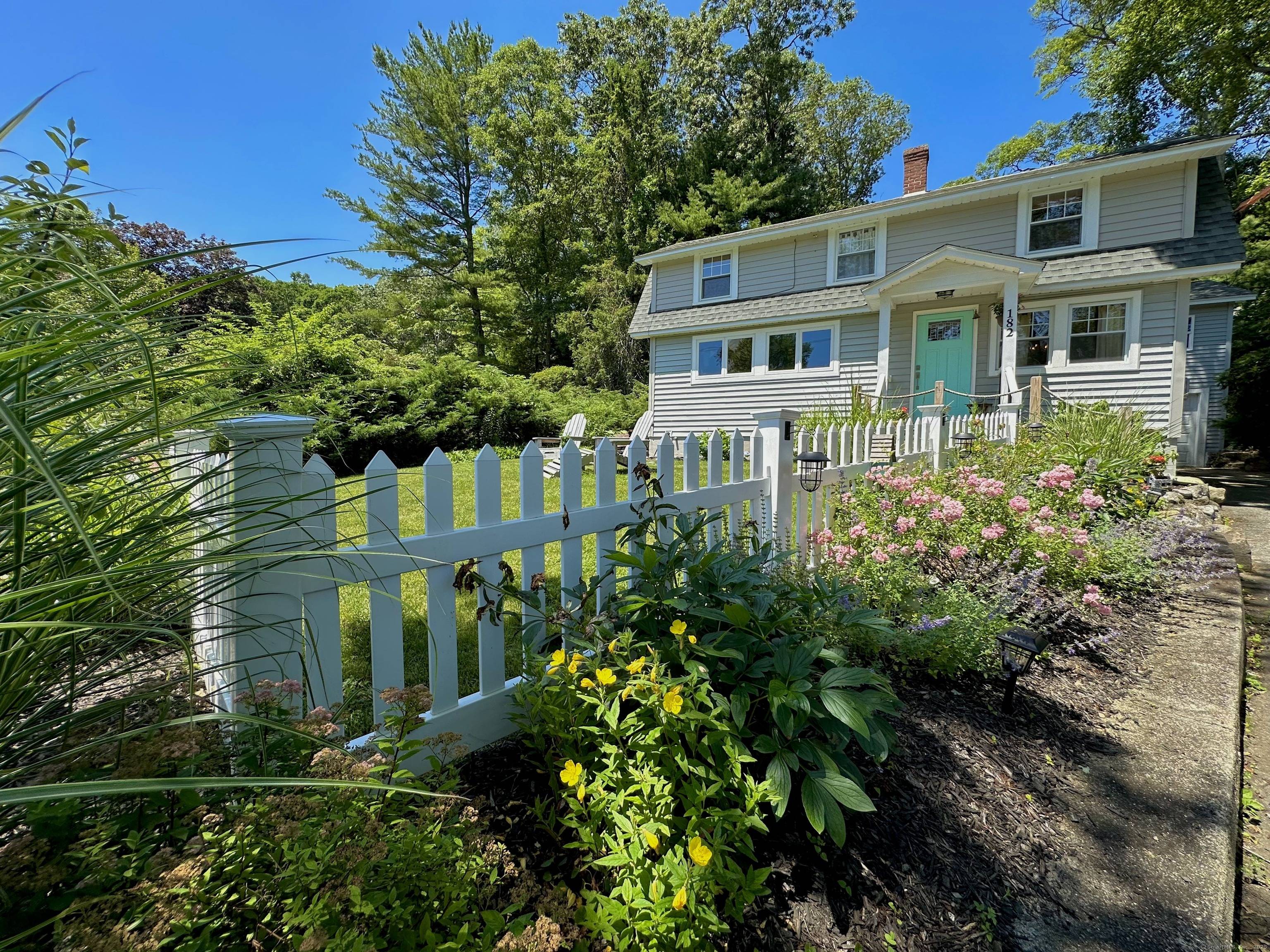 Waterfront Cottage on Saltwater Cove with Dock, Gardens Carriage House Potential Tucked along a peaceful saltwater cove, this charming 2 bedroom, 1.