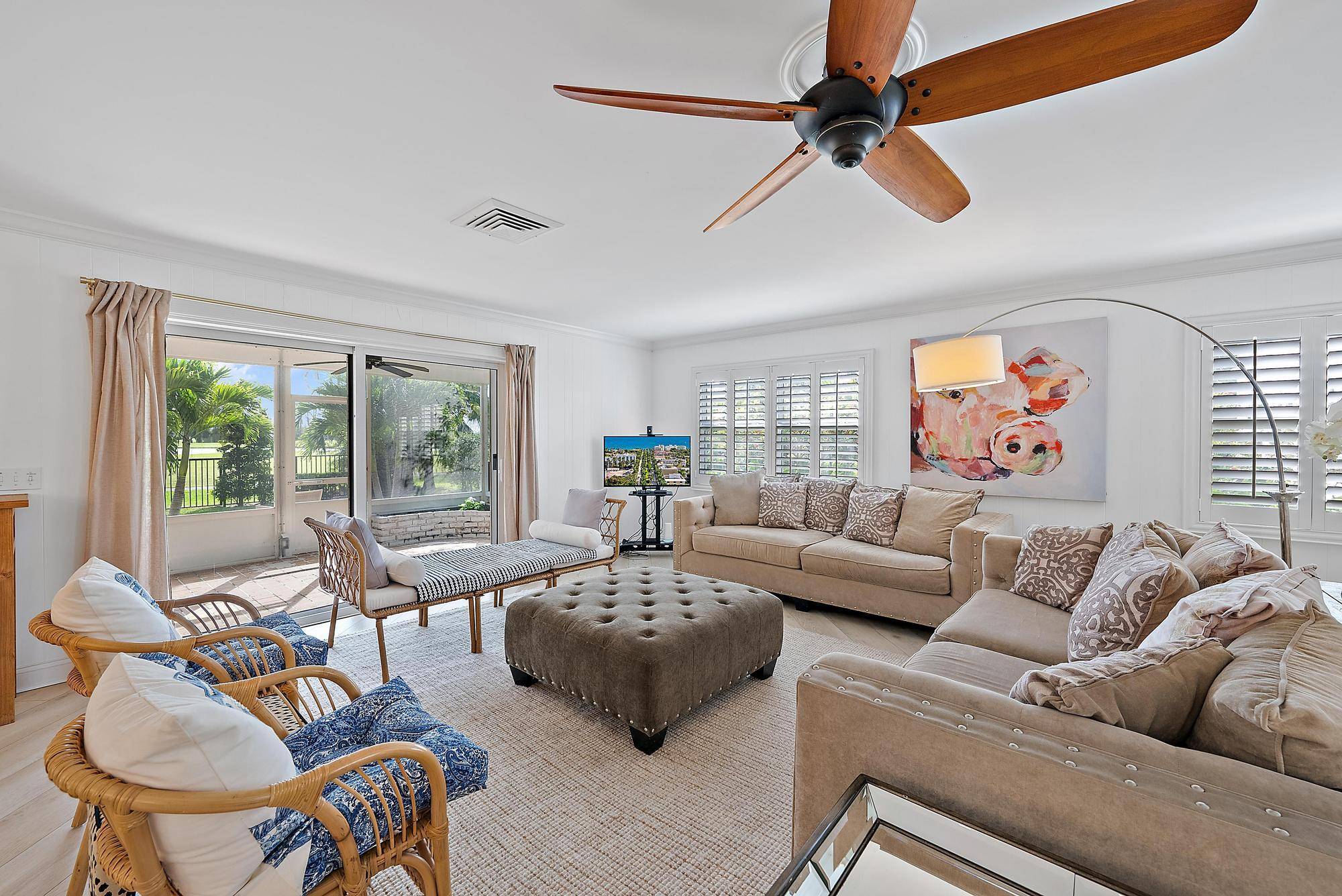 Direct golf course home nestled in the charming, tree lined Old Lucerne Historic District.