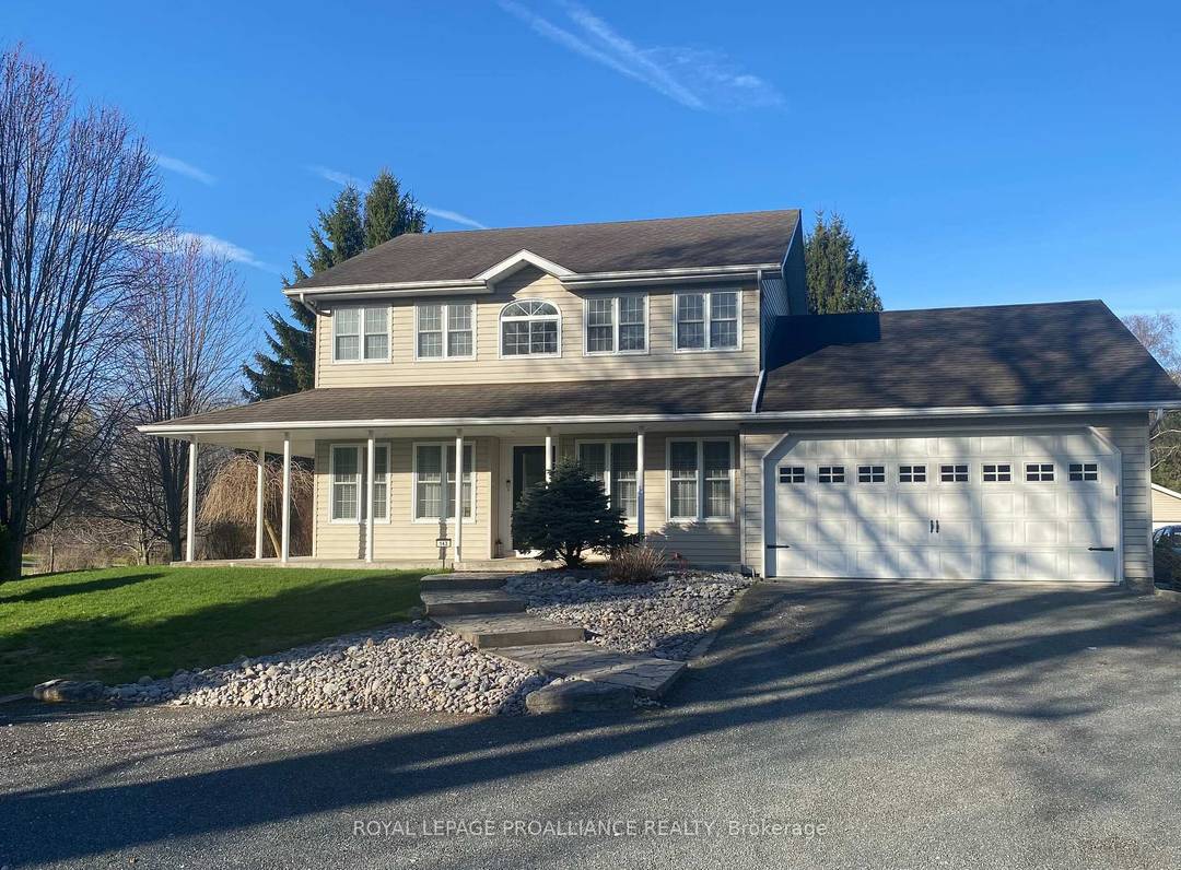 Welcome to this wonderful family home set on a quiet road in beautiful Prince Edward County, offering just under 5 acres of manicured property and two impressive outbuildings.