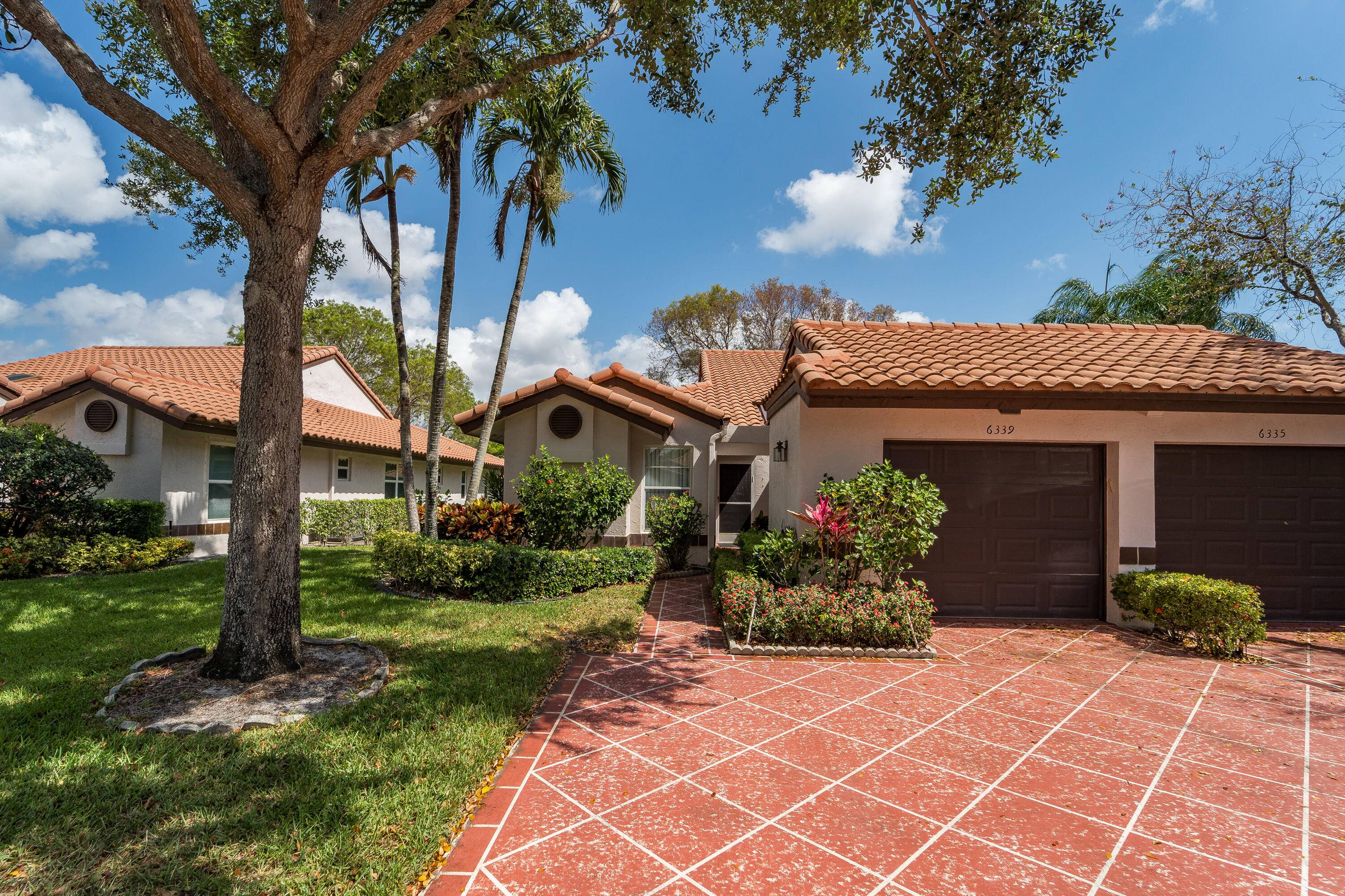 Lovely and light filled, this 2 bedroom, 2 bath villa with den and attached one car garage offers comfort, style, and plenty of space to make your own.