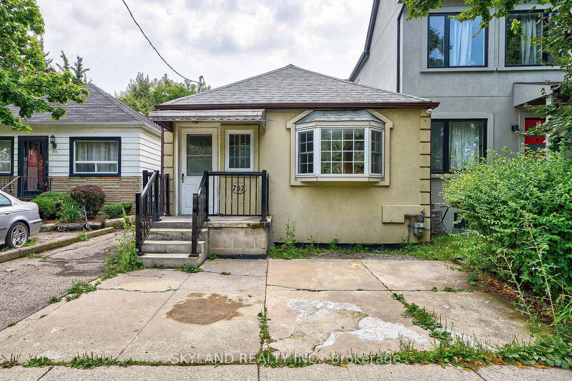 Live in or invest with this well maintained home featuring a separate basement entrance and walkout to a large backyard.