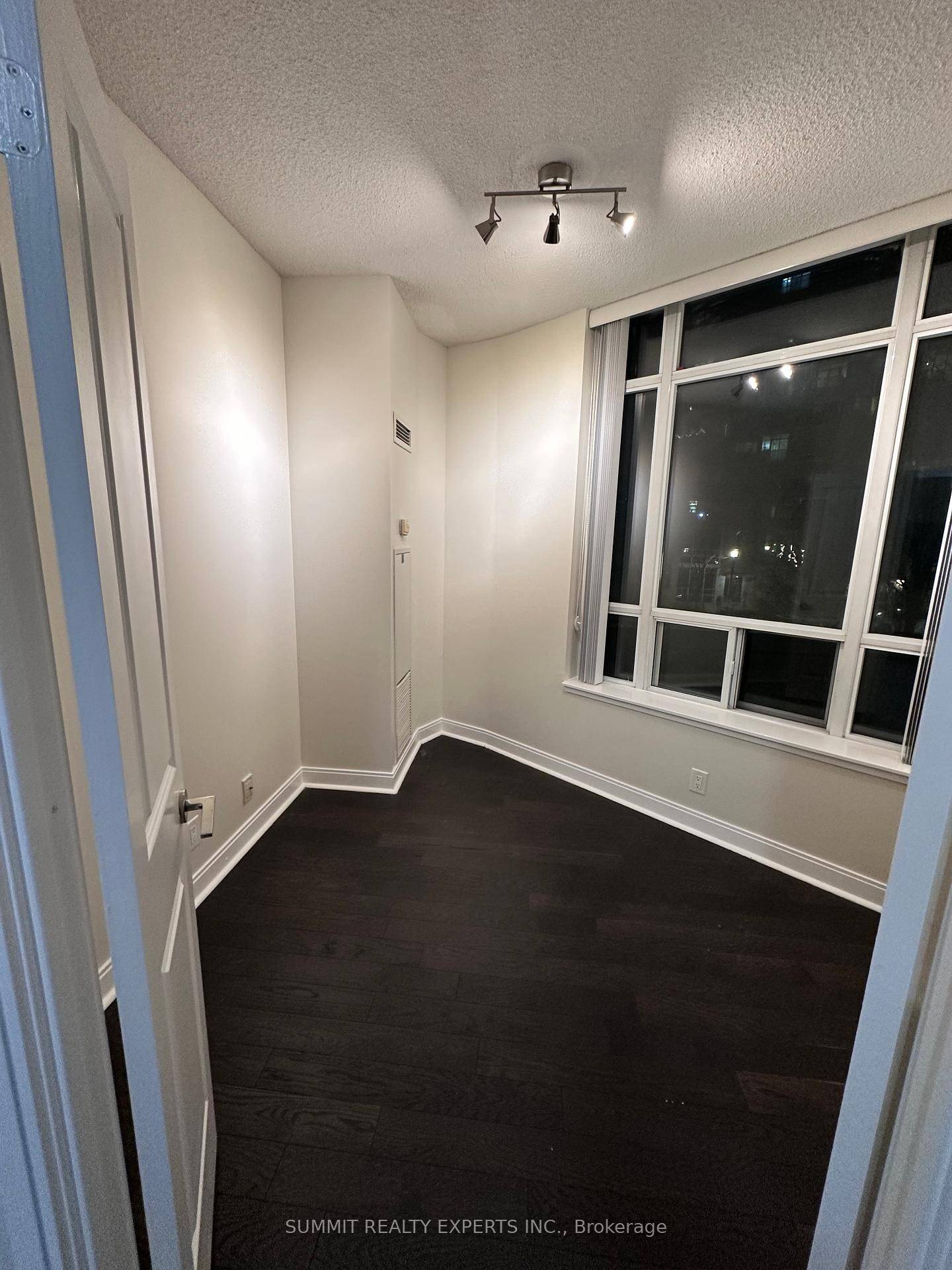 Welcome to Suite 205 a bright and functional 2 bedroom den, 2 bathroom condo in the heart of Mississauga City Centre.