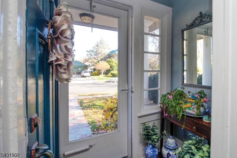 Welcome Home ! ! Nestled on a double lot, this four story, 6 bedroom colonial offers plenty of space.