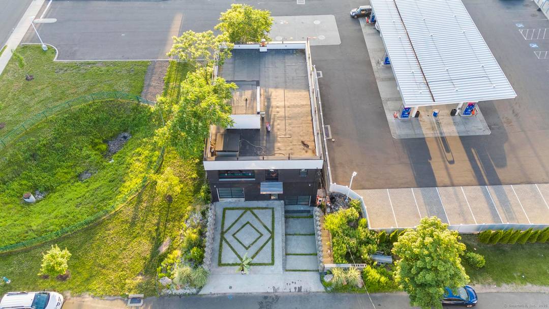 In the heart of Hamden's emerging commercial corridor, 12 Victor Street stands as a bold architectural statement a modern black brick structure reimagined for today's visionary operator.