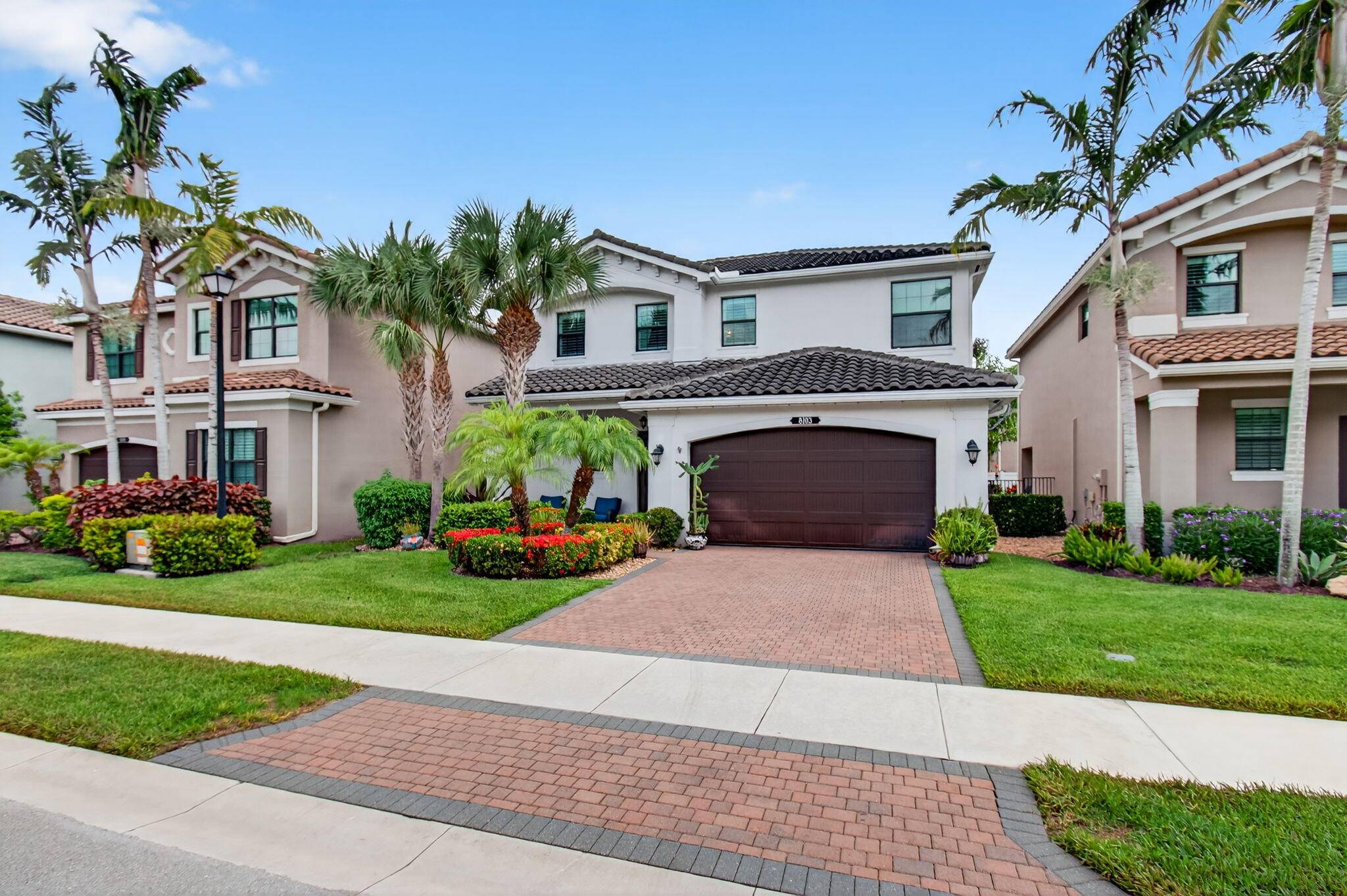 This Stylish and Sophisticated Single Family Home Effortlessly Blends Warm Classic Design with Inviting Modern Touches The Welcoming Foyer Leads to a Spacious, Open Floor Plan Filled with Natural Light ...