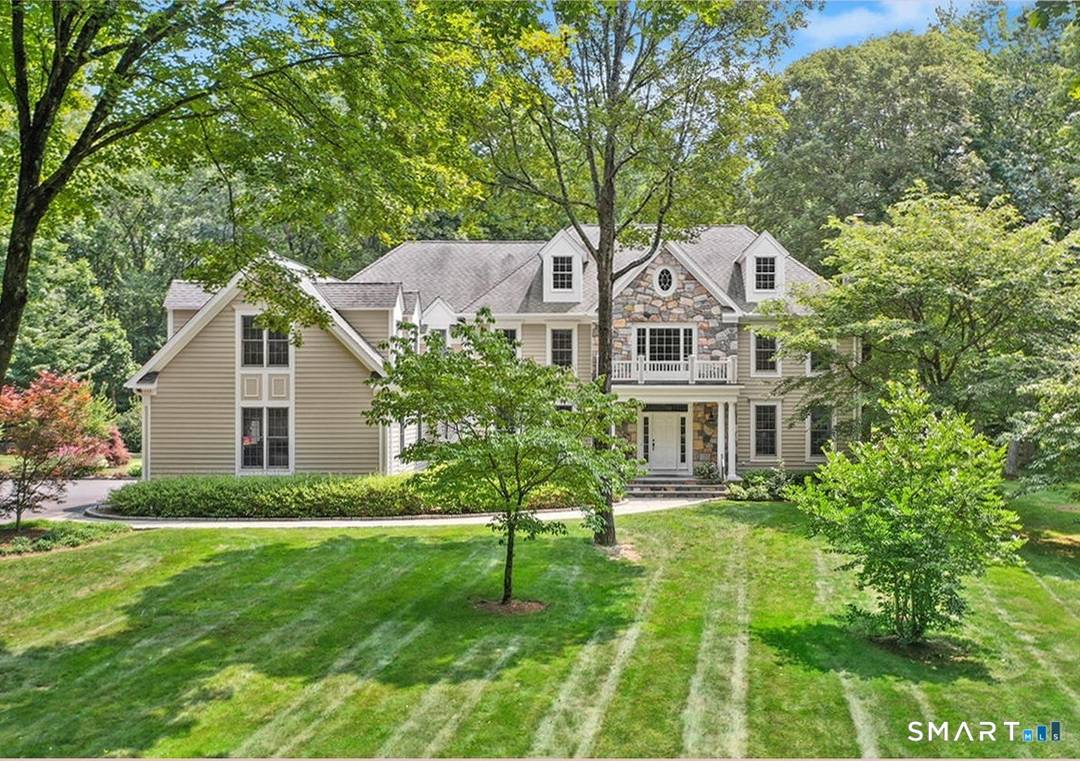 Nestled on three picturesque acres and surrounded by open space, this beautiful country retreat offers privacy, comfort, and exceptional outdoor living.
