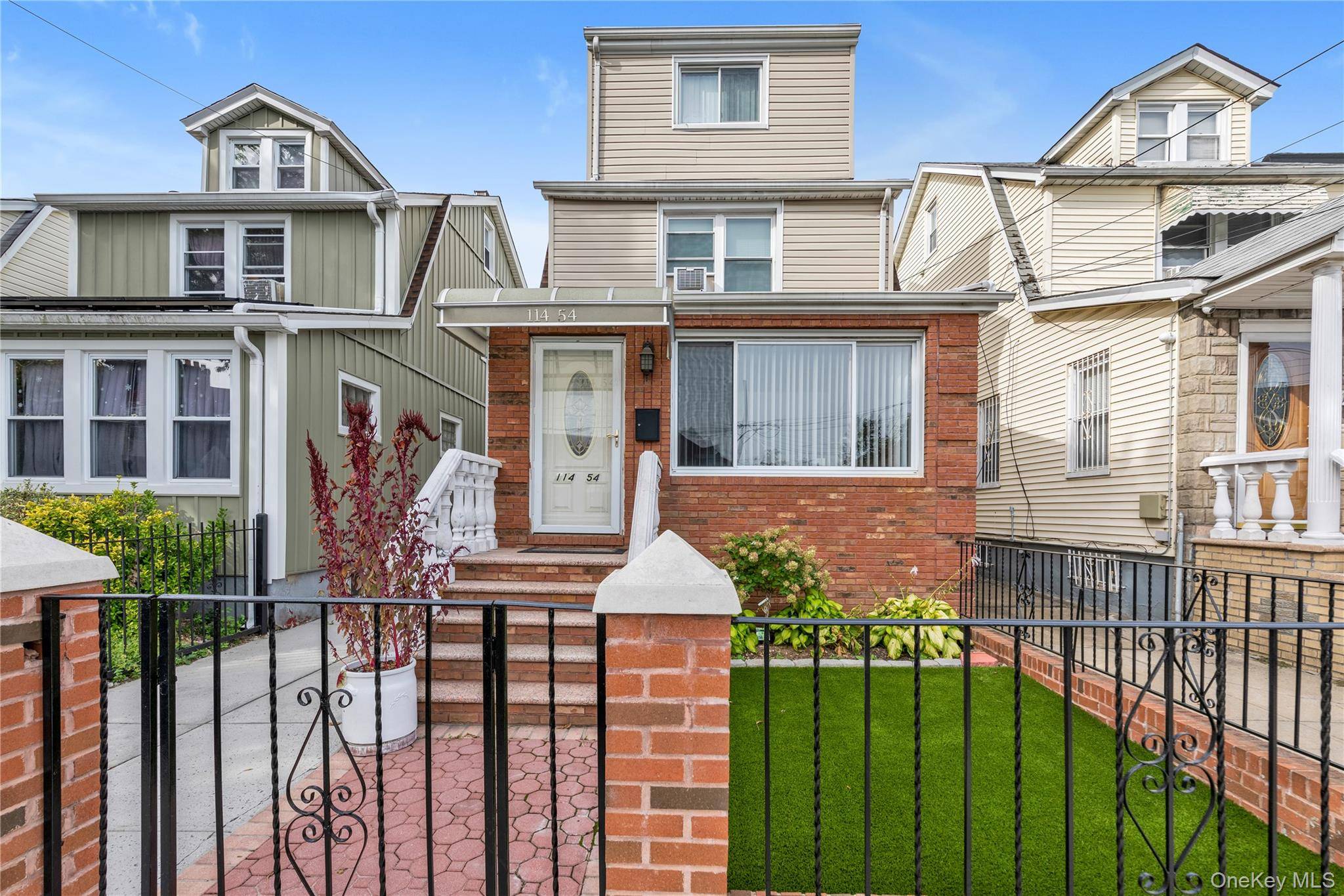 Welcome to this beautiful one family detached colonial in Cambria Heights.