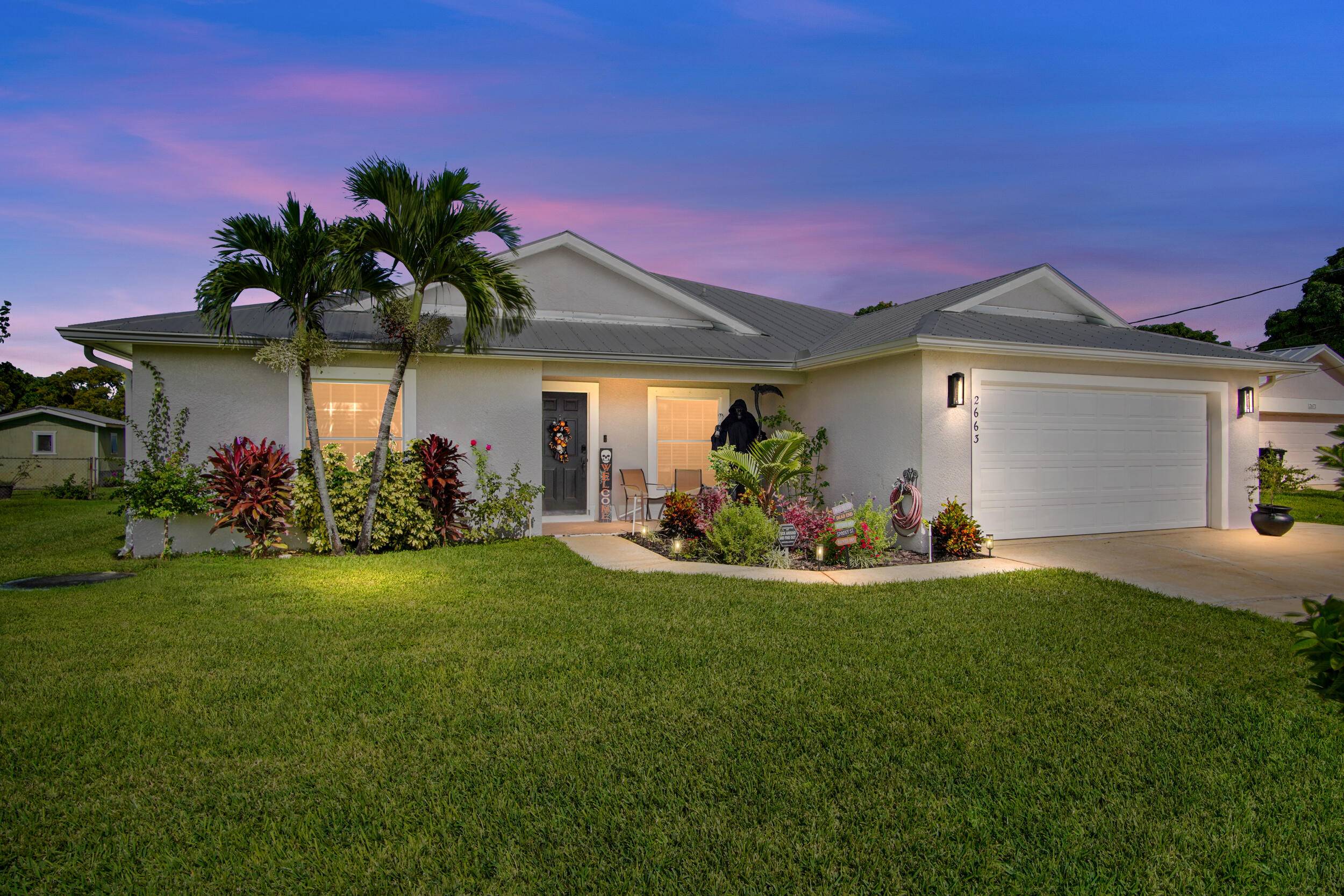 Spacious 4 bedroom, 3 bathroom, 2 car garage home backing up to a peaceful canal, offering water views and added privacy.