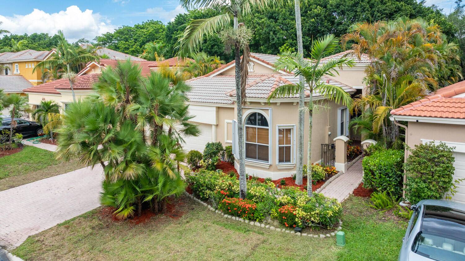Enjoy the country club lifestyle of the renowned community of Heron Bay !