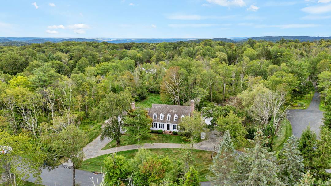 Welcome to this striking Cape Colonial nestled on a picture perfect, dead level parcel in one of Sherman's most desirable locations.