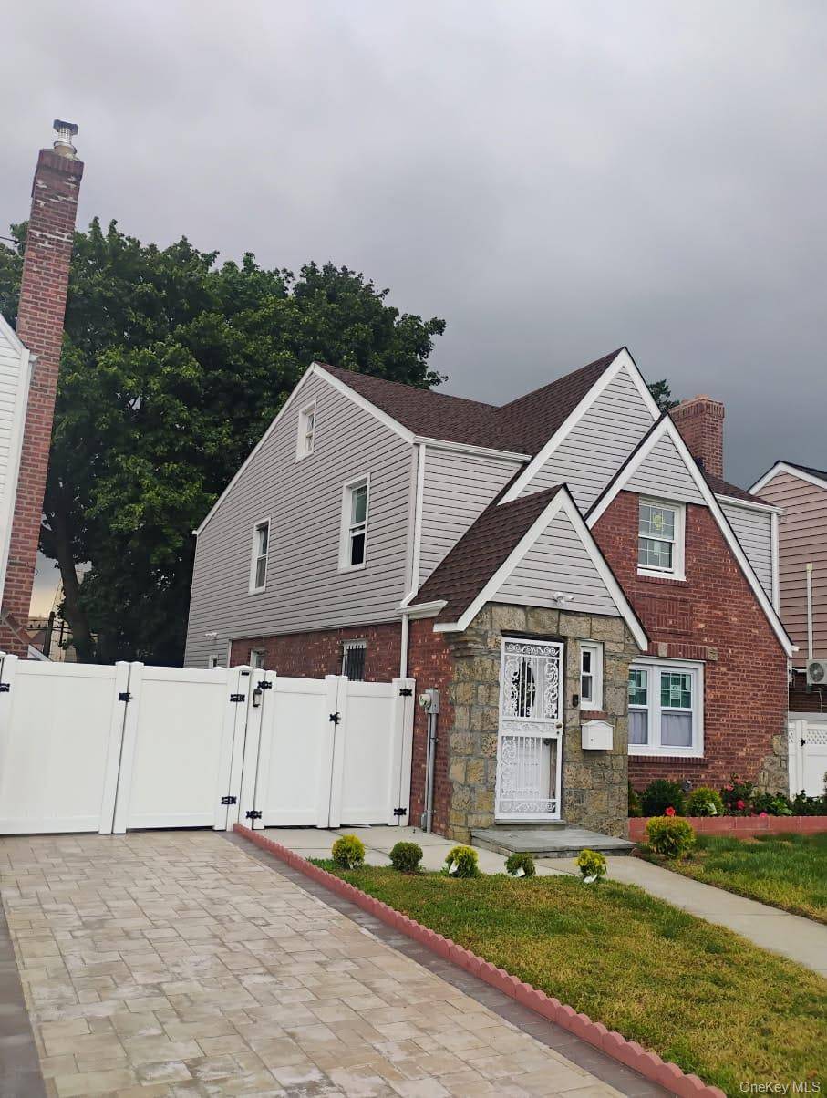 Discover the elegance and timeless charm of this beautifully refined brick residence in the sought after Cambria Heights community.