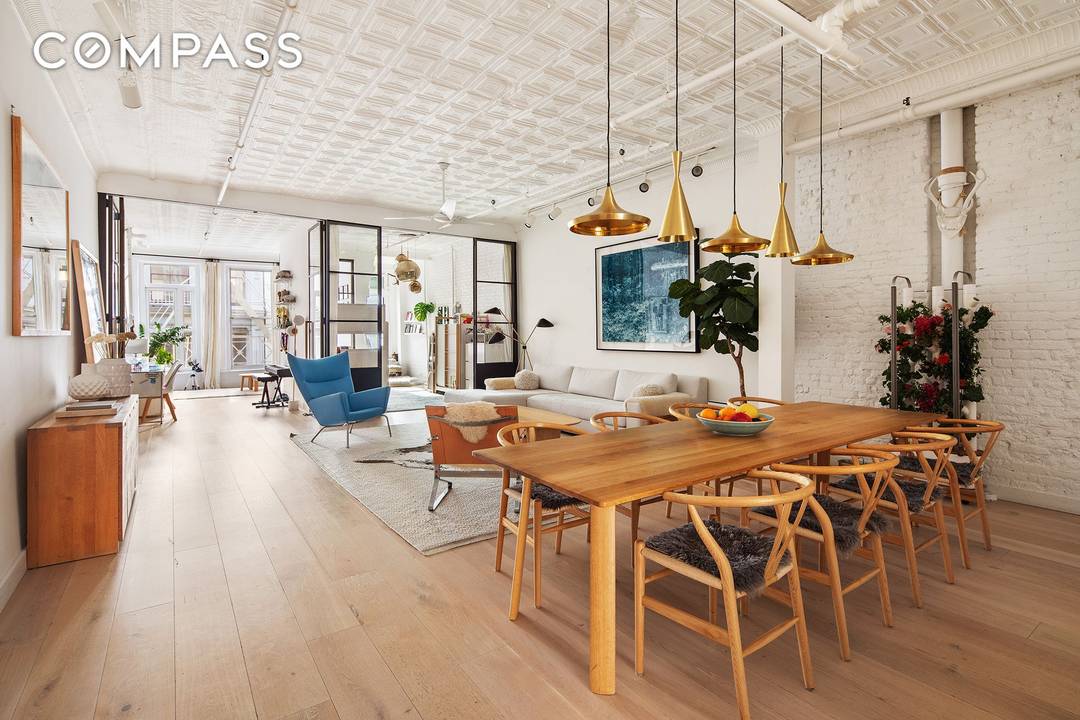 Welcome to this exquisite loft at 75 Grand Street, Unit 3E, nestled in the heart of Manhattan's vibrant SoHo neighborhood.