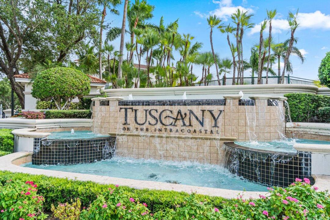 Welcome to Tuscany on the Intracoastal, an exceptional three bedroom, two bath residence nestled within the prestigious gated waterfront enclave.